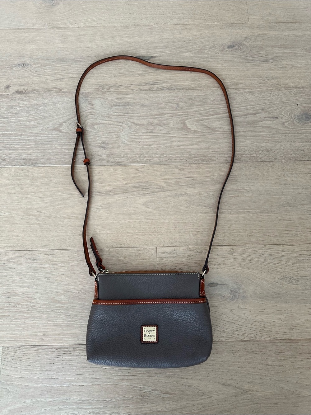 Dooney & Bourke Gray Crossbody with Brown Trim and Adjustable Strap